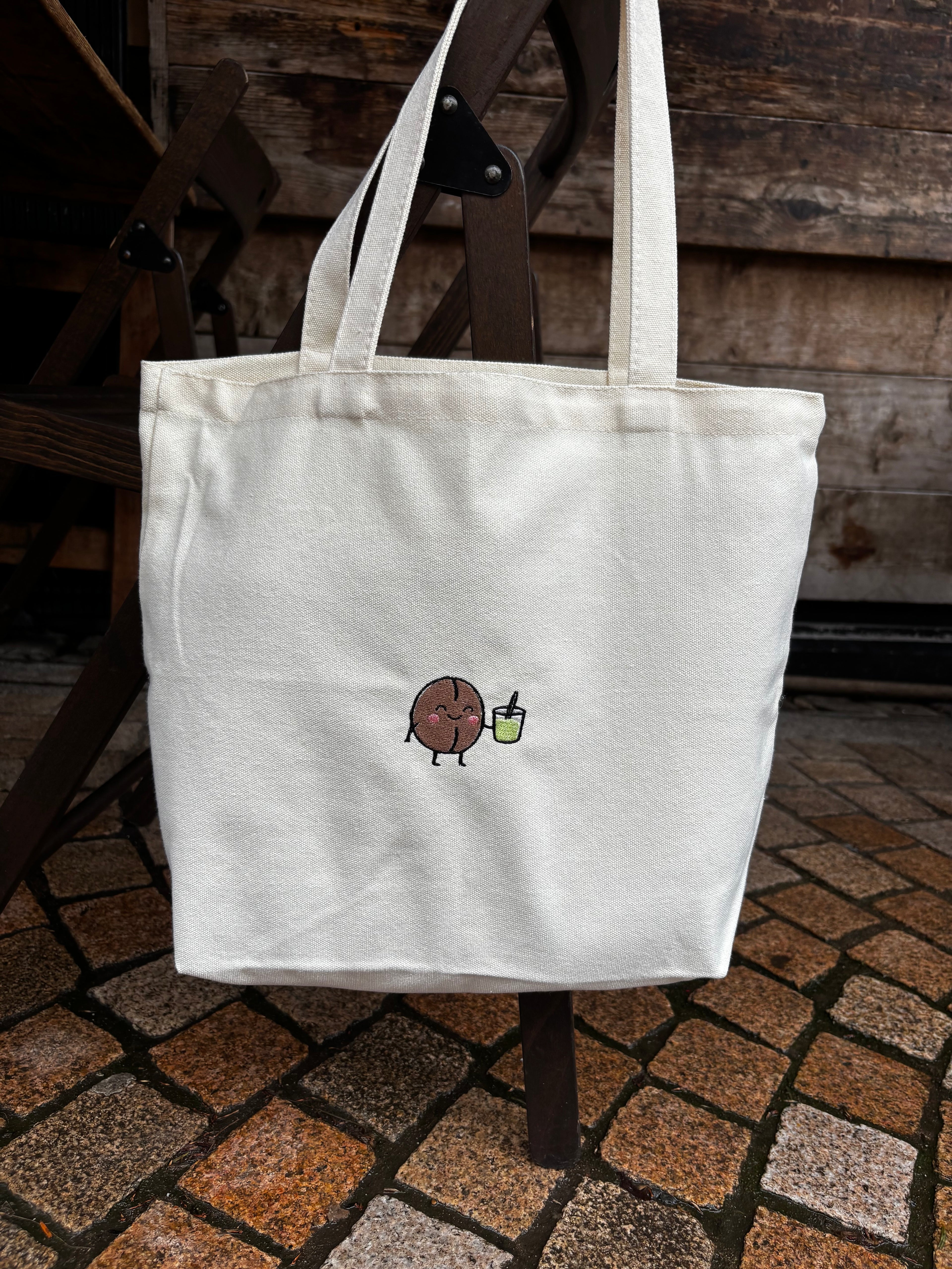 Large white tote bag with embroidered matcha coffee bean 