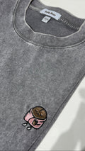Gray sweatshirt with a coffee cup and donut patch on a white background
