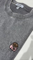 Gray sweatshirt with a coffee cup and donut patch on a white background